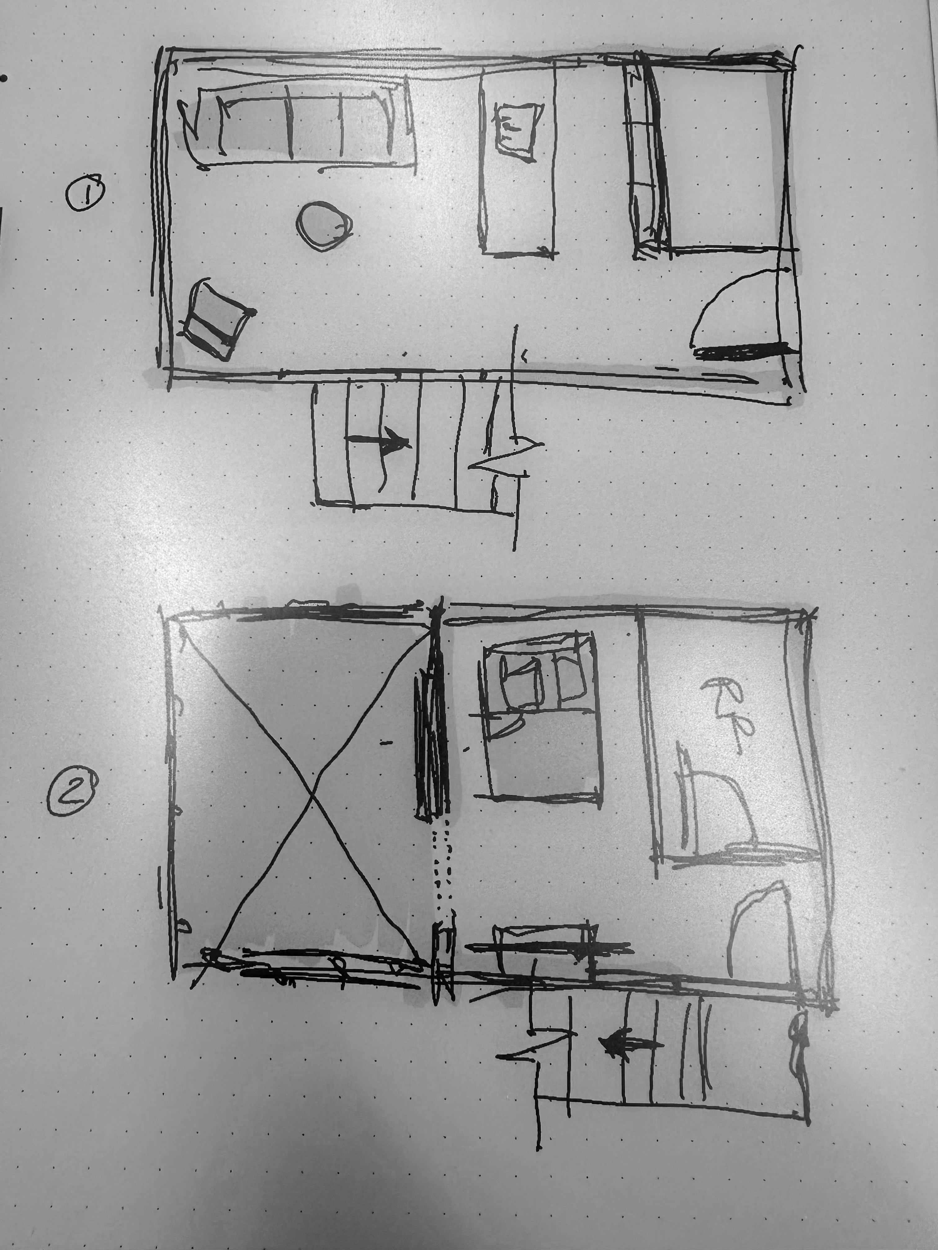 Hand-drawn pen sketch on dot-grid paper of two small-home floor plan options, showing a sofa, round table, bed, bathroom and stairs.
